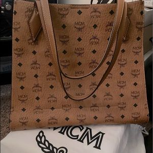 Authentic MCM Luisa Tote gently used, near perfect condition. No scratches.